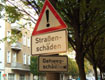 Schild: Strassenschaeden-f10-018-60